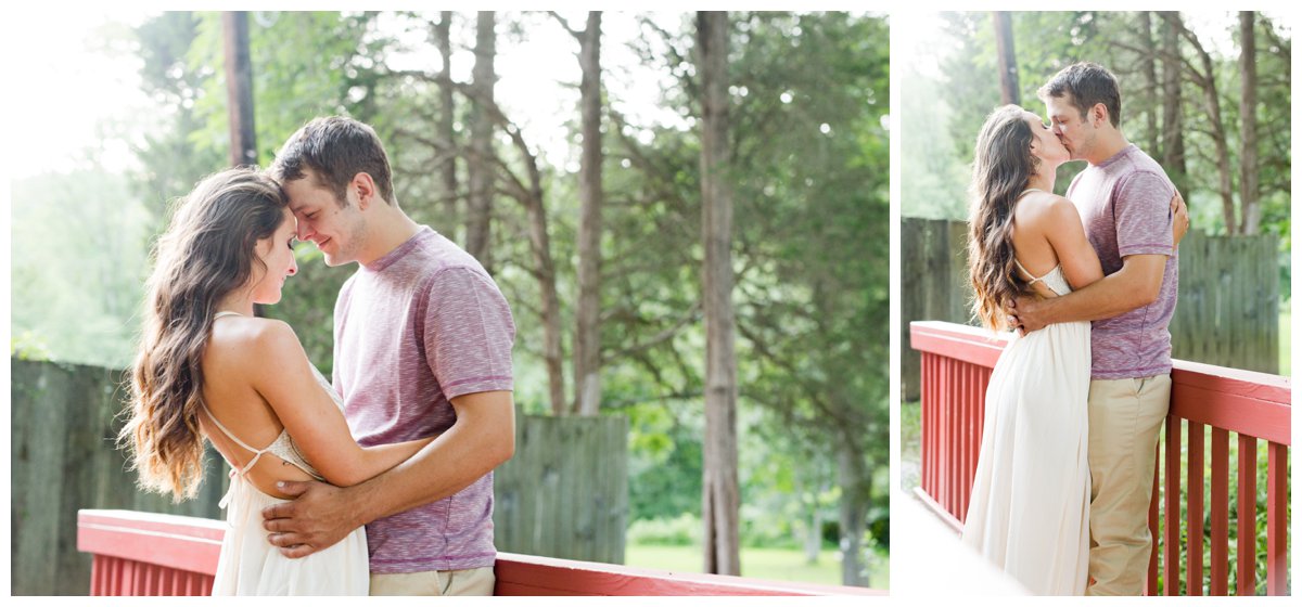 Jerusalem Mills Bohemian Engagement Photography in a white dress while on a red walking bridge.