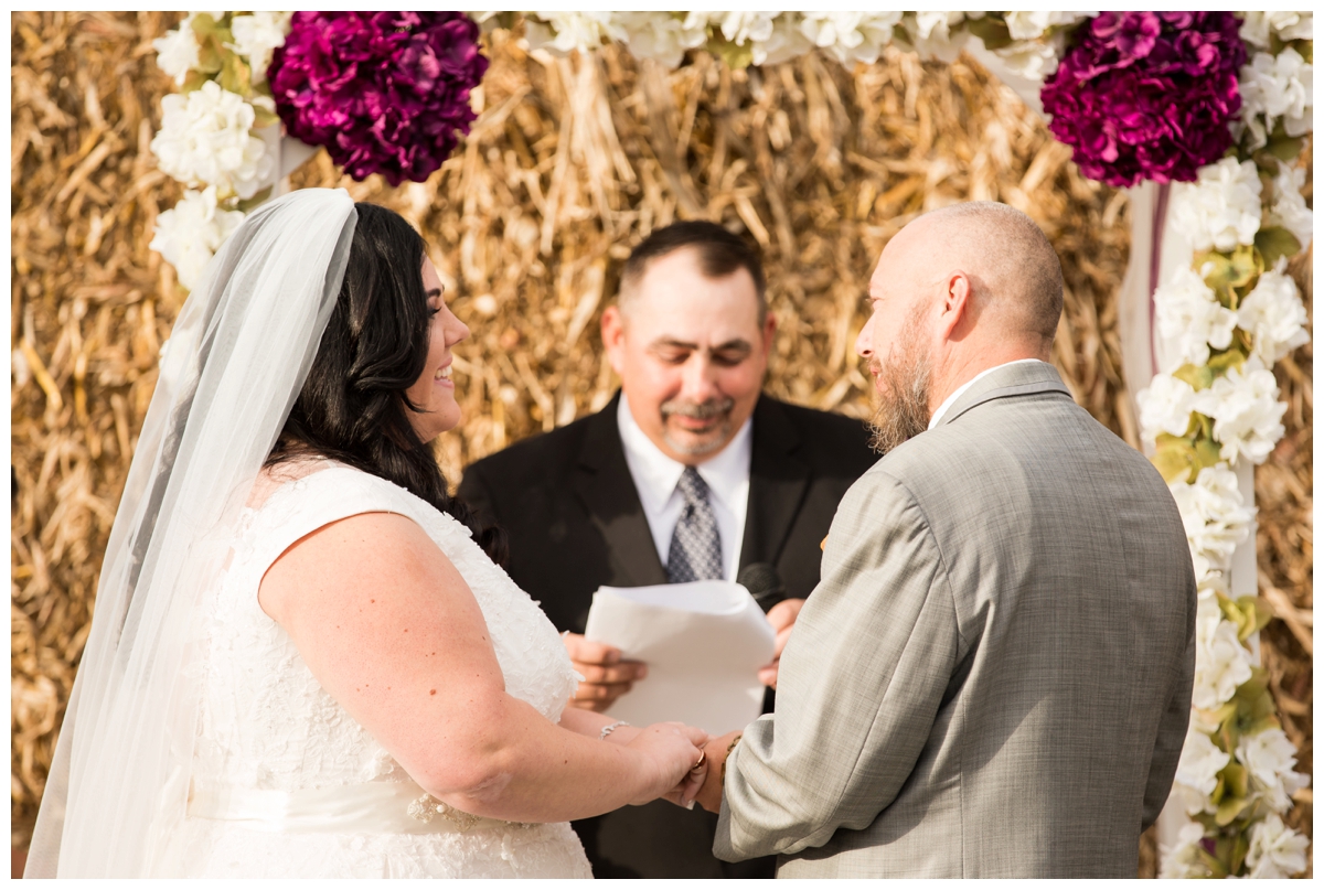 Couple excited to place rings on each other