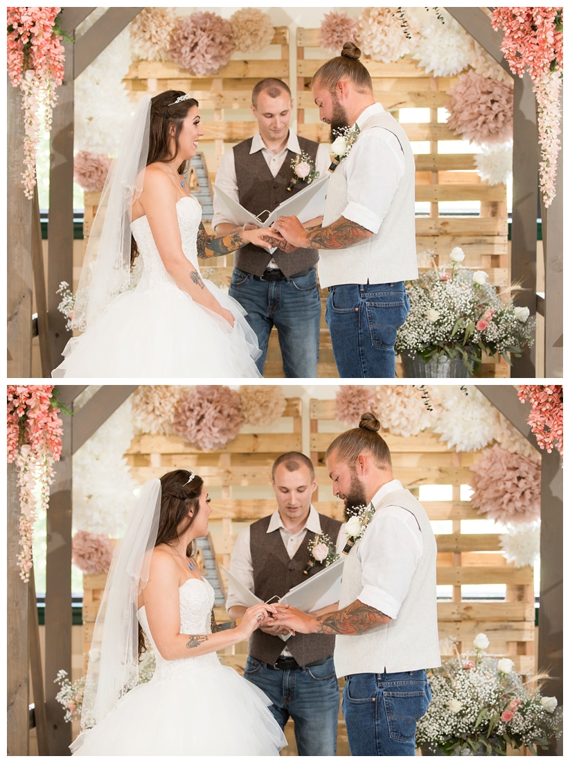 Indoor wedding ceremony. Rustic Wedding Decor. Rose Gold wedding decor. Wooden arbor with flowers. Maryland wedding at Circle D Farm in Woodbine. Maryland Wedding Photographer.Bride and Groom exchanging rings.