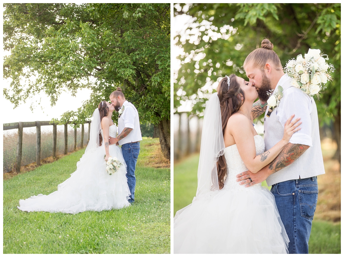 Outdoor bride and groom portraits. Bride and groom kissing under a tree. Maryland wedding at Circle D Farm in Woodbine. Maryland Wedding Photographer.