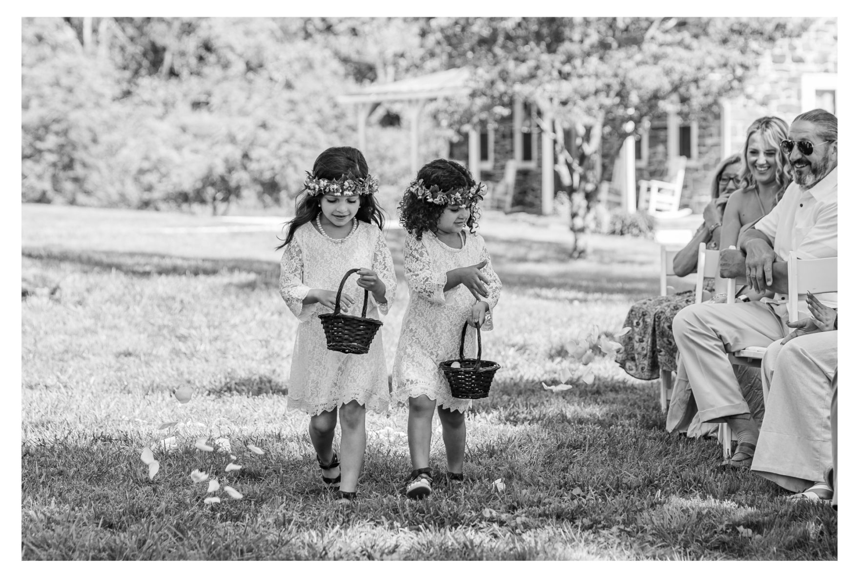 Summer wedding at a private residence farm in Westminster Carroll County Maryland. Cicadas, cows and dogs at the wedding. Pond view ceremony flower girls