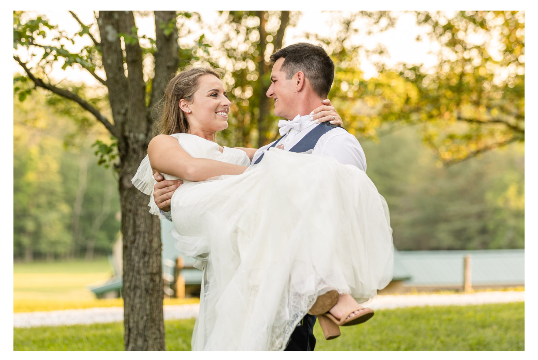 Summer wedding at a private residence farm in Westminster Carroll County Maryland. Cicadas, cows and dogs at the wedding. Pond view bride and groom