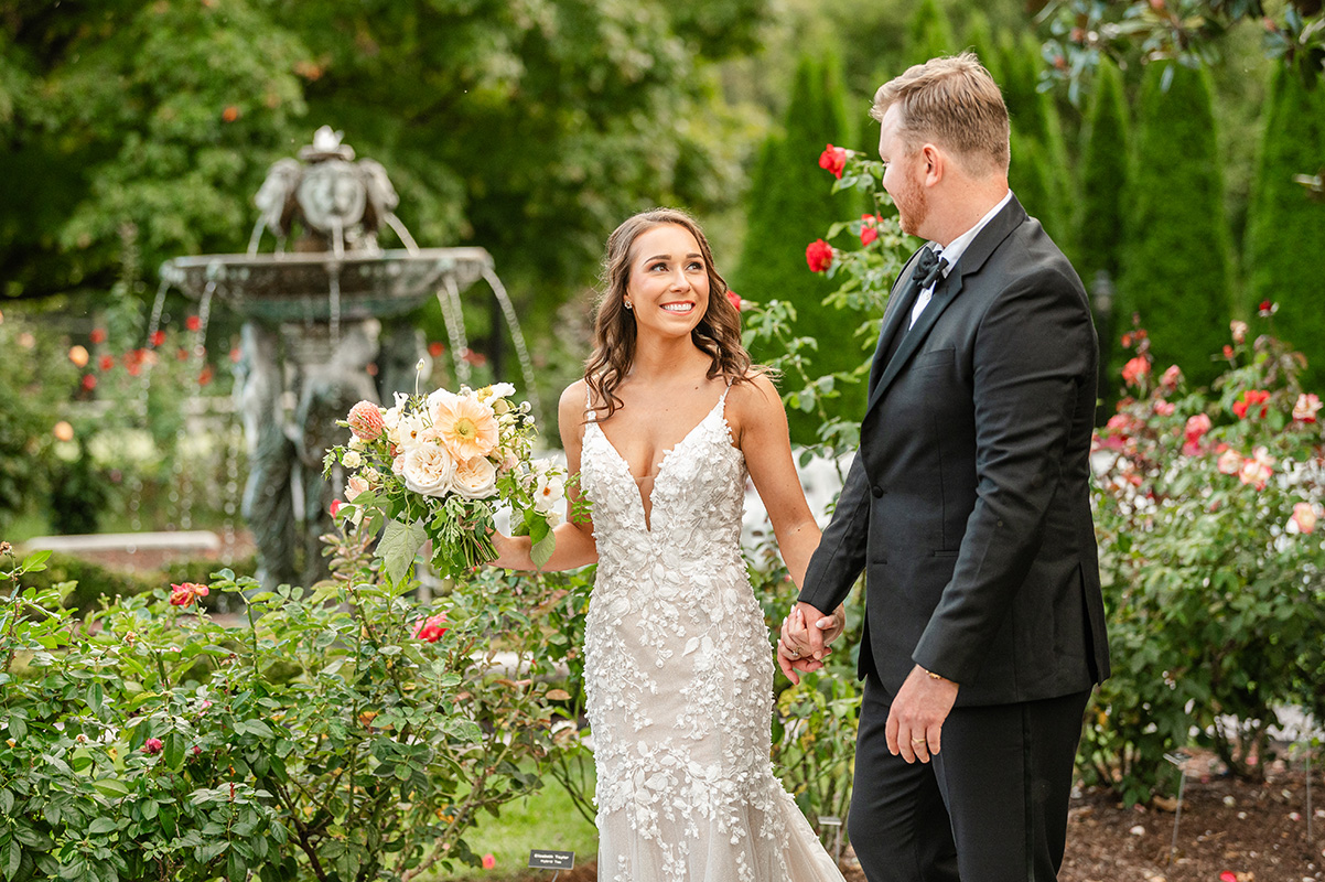 Antrim 1844 Summer Wedding Rose Garden Portraits Bride and groom in rose garden, walking wedding photos, candid wedding photos, Garden fountain, maryland wedding, carroll county wedding, frederick county wedding, wedding photographer