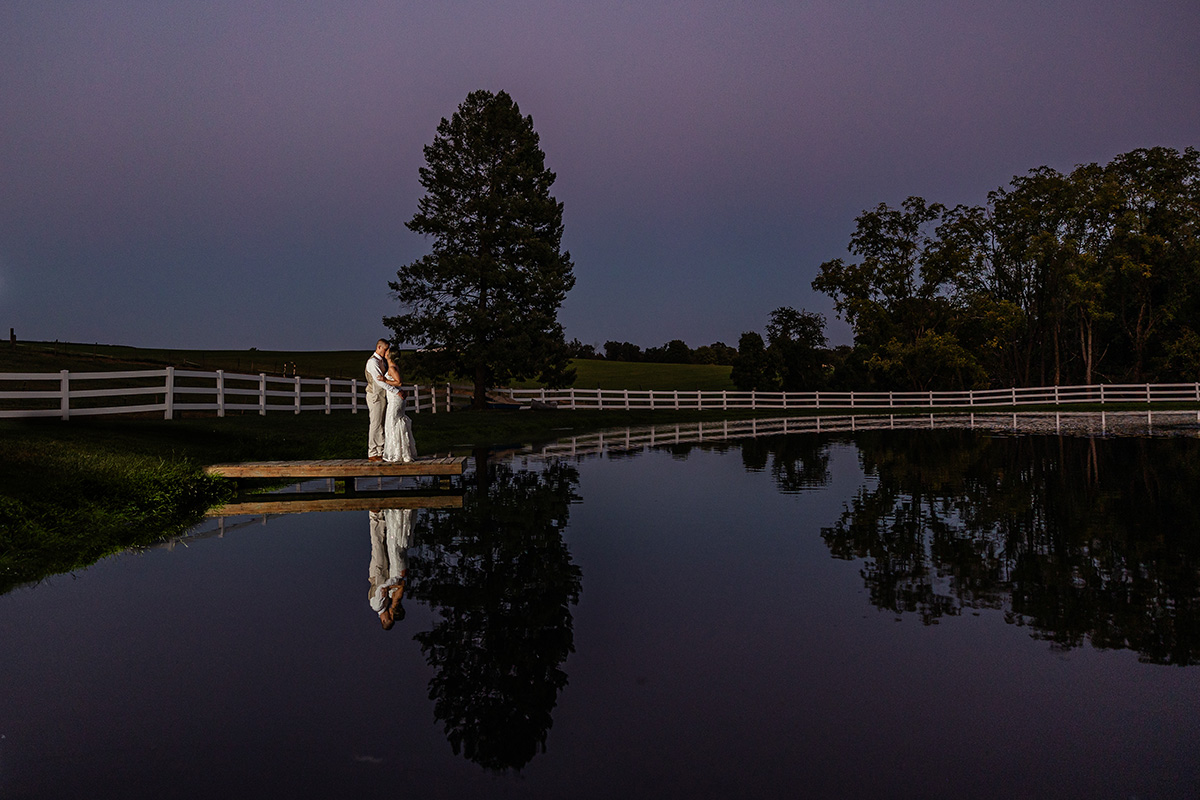 Pond View Farm Wedding. Sunset Wedding Portrait. Sunset on Pier. Sunset on Pond. Night Wedding Photography. Wedding Sunset Photos. Water reflection. Bride & Groom. Maryland Wedding Photographer